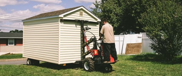 Shed delivery with a shed mule - a walk-behind machine.